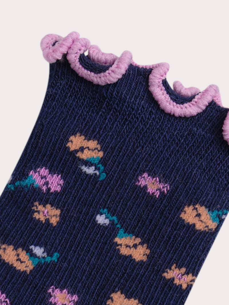 Calcetines marinos ribeteados con flores para bebé niña