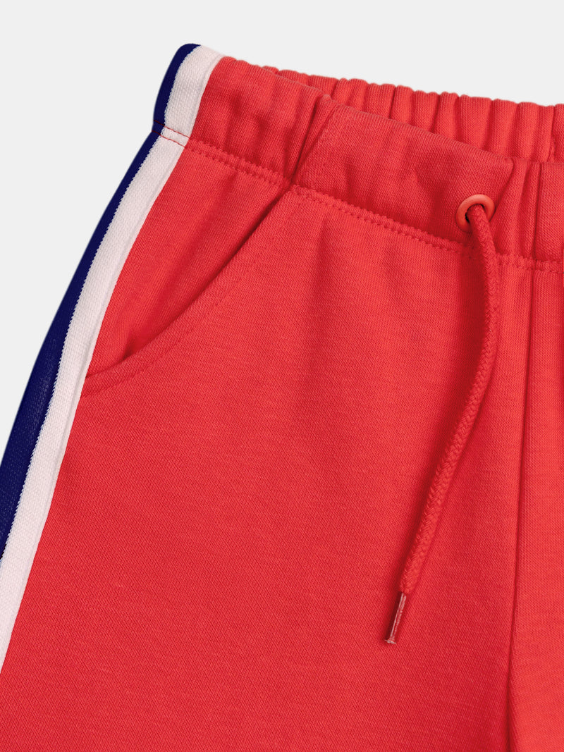 Pantalones rojos de felpa con rayas de colores para niñas