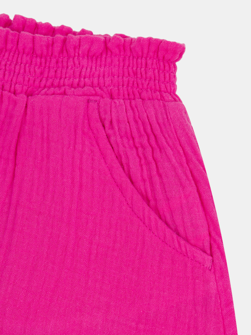 Short rosa con bolsillos para niña