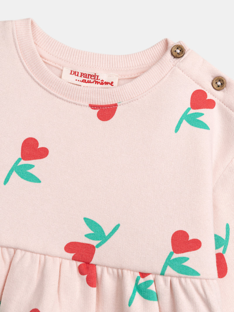 Vestido rosa con estampado de flores y corazones para niña