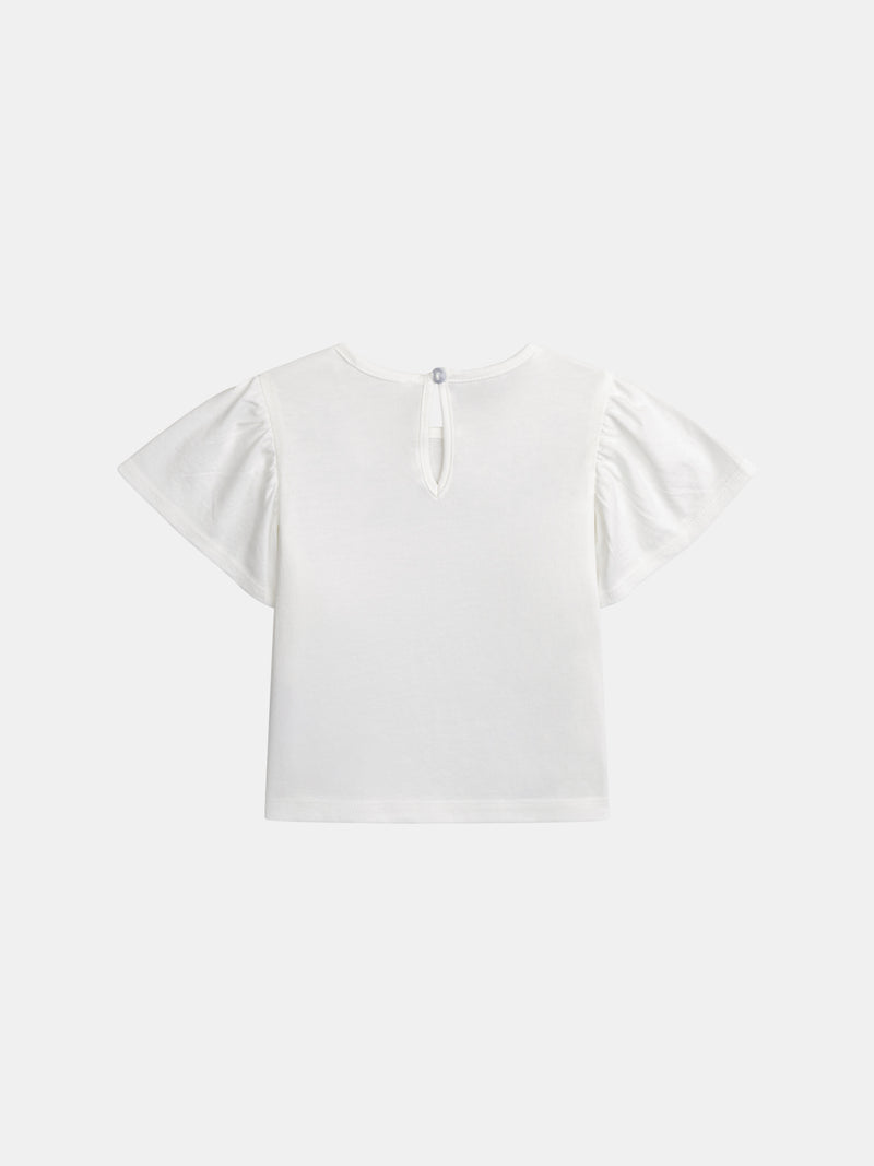 Camiseta ecru bordada con flores y mangas con volantes para niña