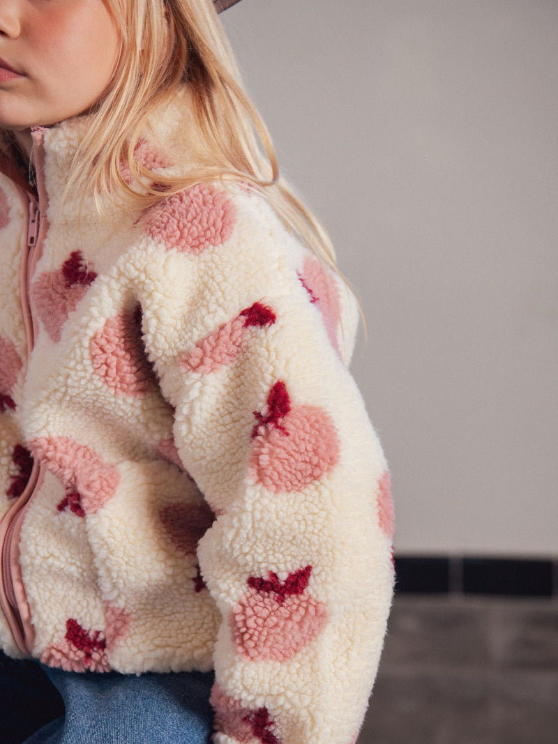 Cardigan ecru con estampado de manzanas para niña