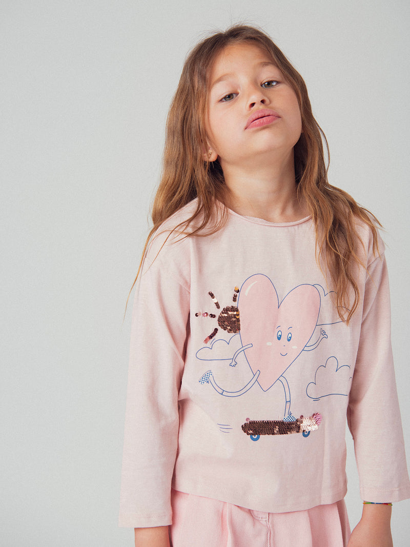 Camiseta de manga larga rosa claro con animación de corazón para chicas