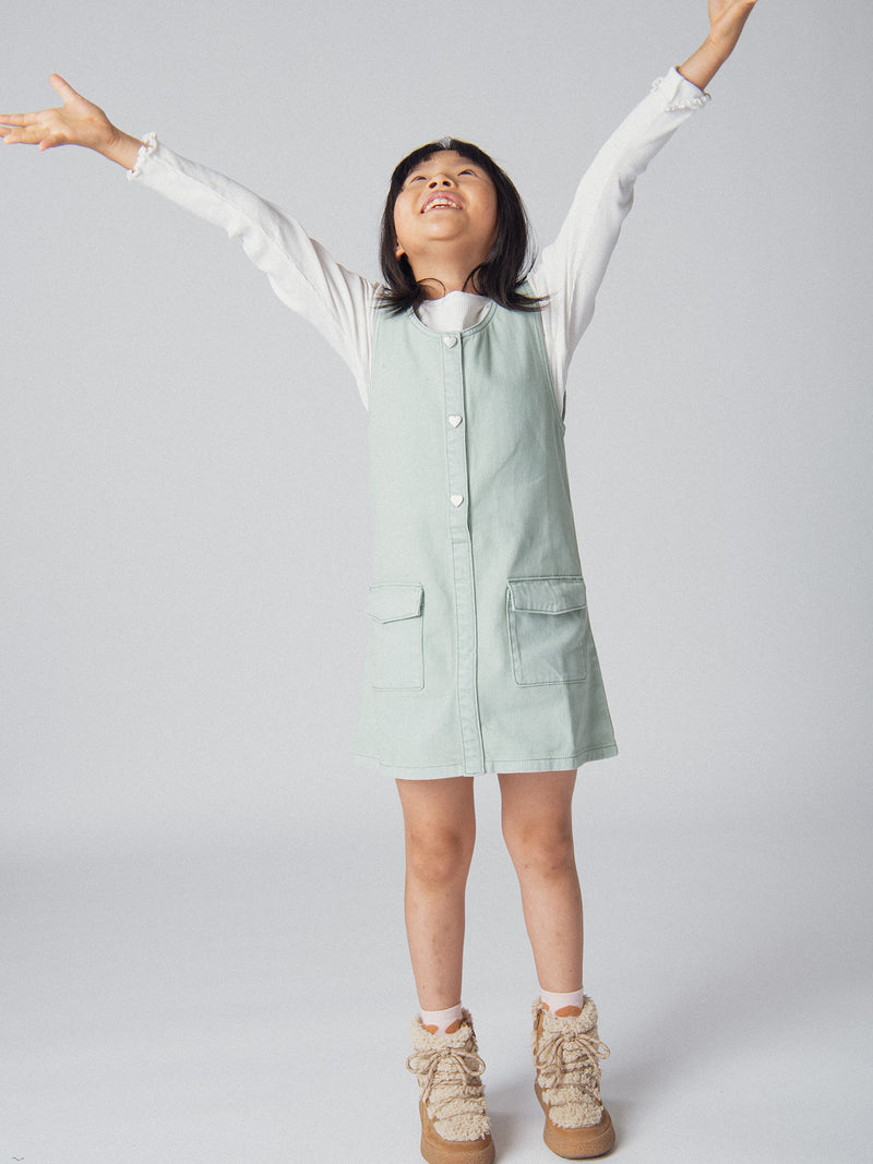 Vestido verde salvia con bolsillos para niñas