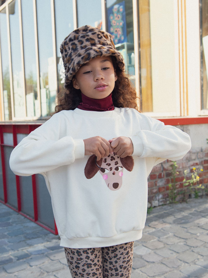 Sudadera crema con animación de perro para niña