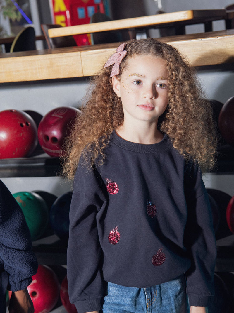 Sweat marine à animations pommes en sequins pour fille