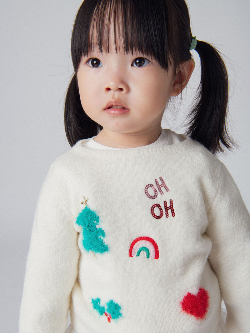 Pull écru à motifs festifs et touches étincelantes pour bébé fille