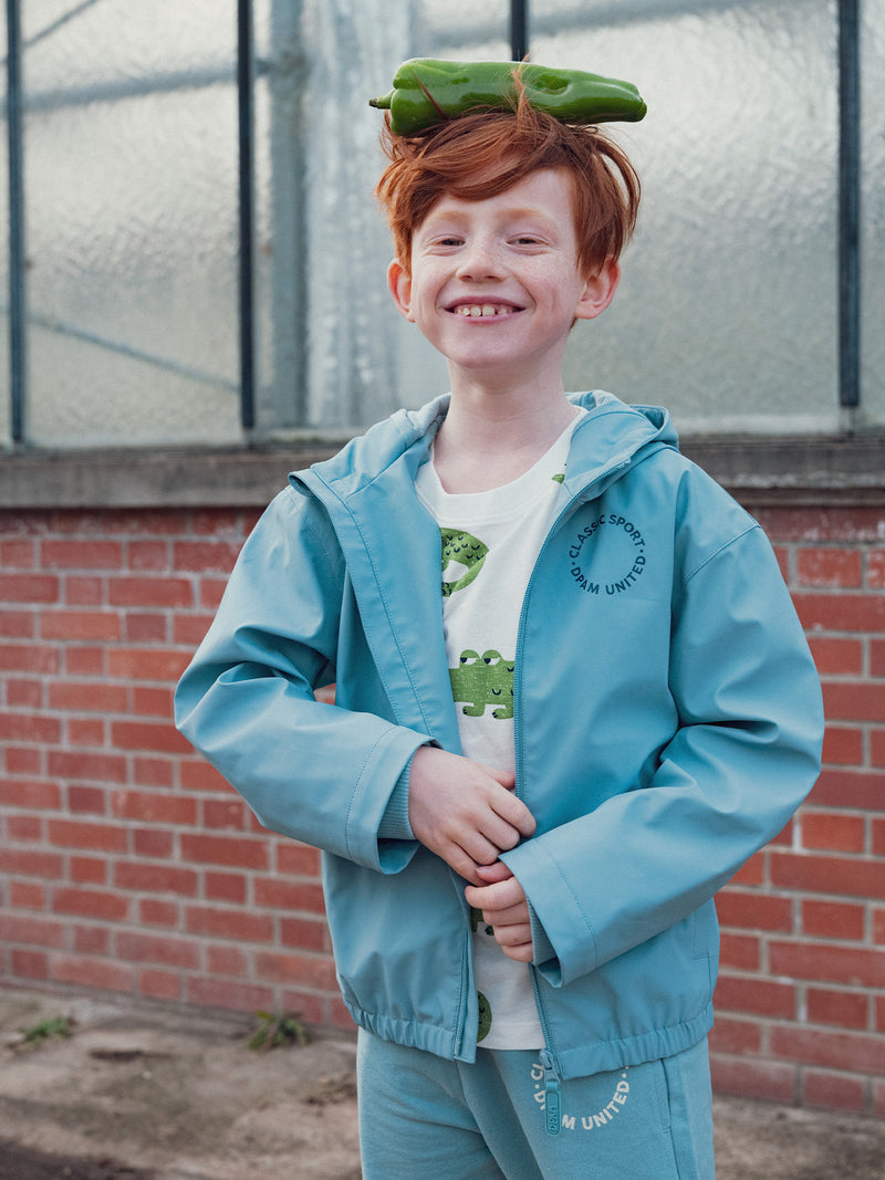 Impermeable azul con capucha para niño