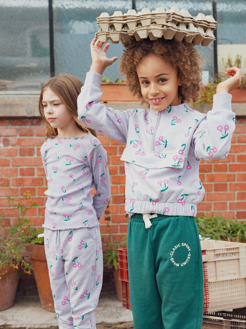 Top de jogging violeta con imprimé de flores para chicas