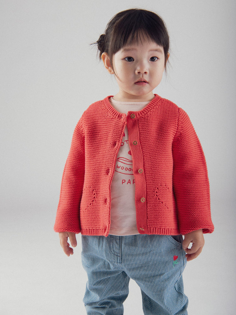 Cardigan de punto sandía con bolsillos de corazón para bebé niña
