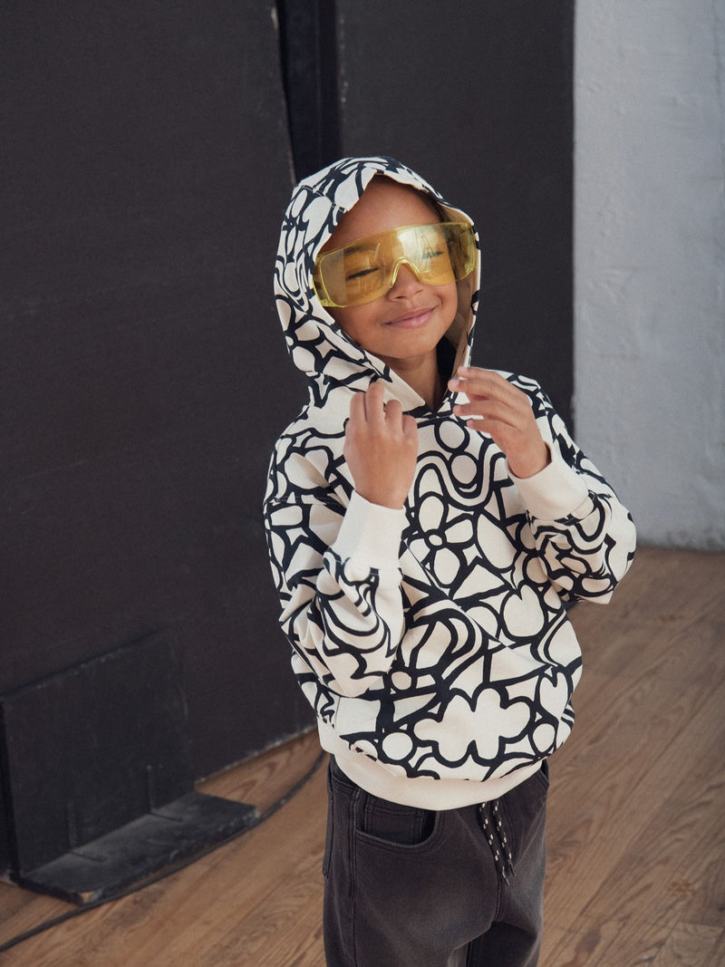 Sudadera crema con estampado gráfico para niño