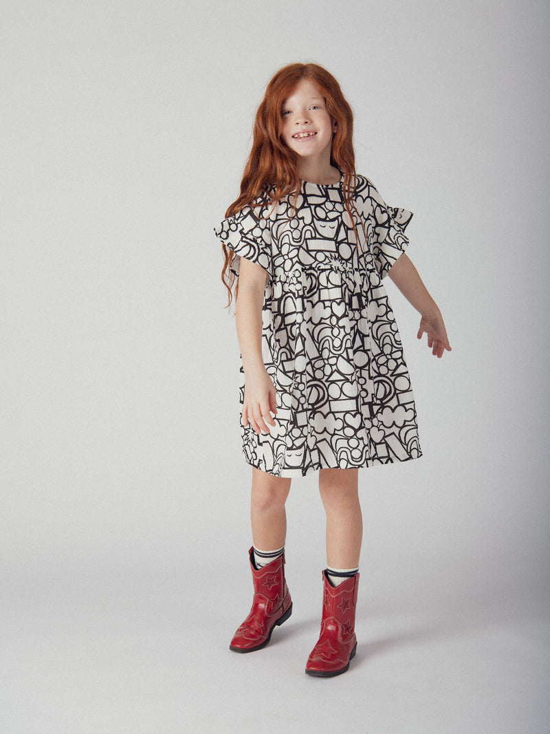 Vestido écru con estampado gráfico para niña