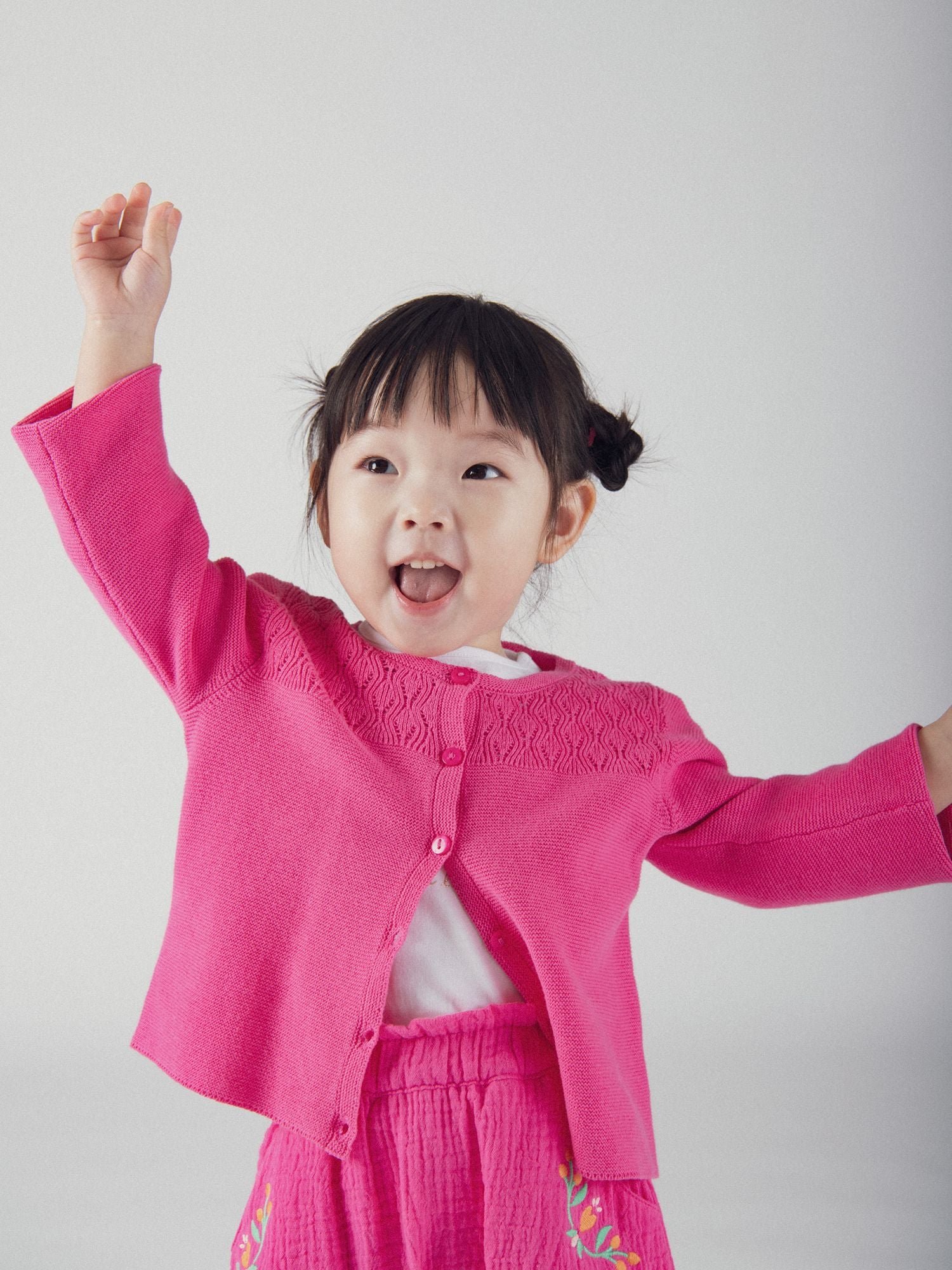 Cardigan de punto rosa pasión para bebés