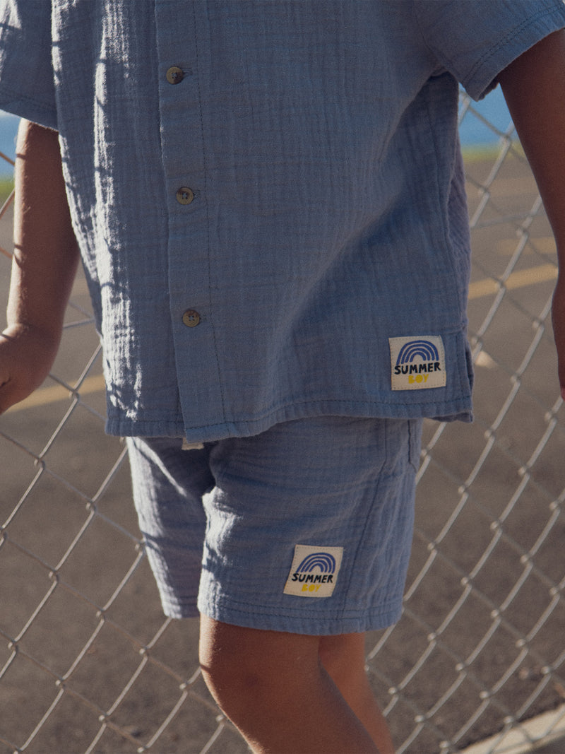 Camisa Azul con Etiqueta de Fantasía para Niño