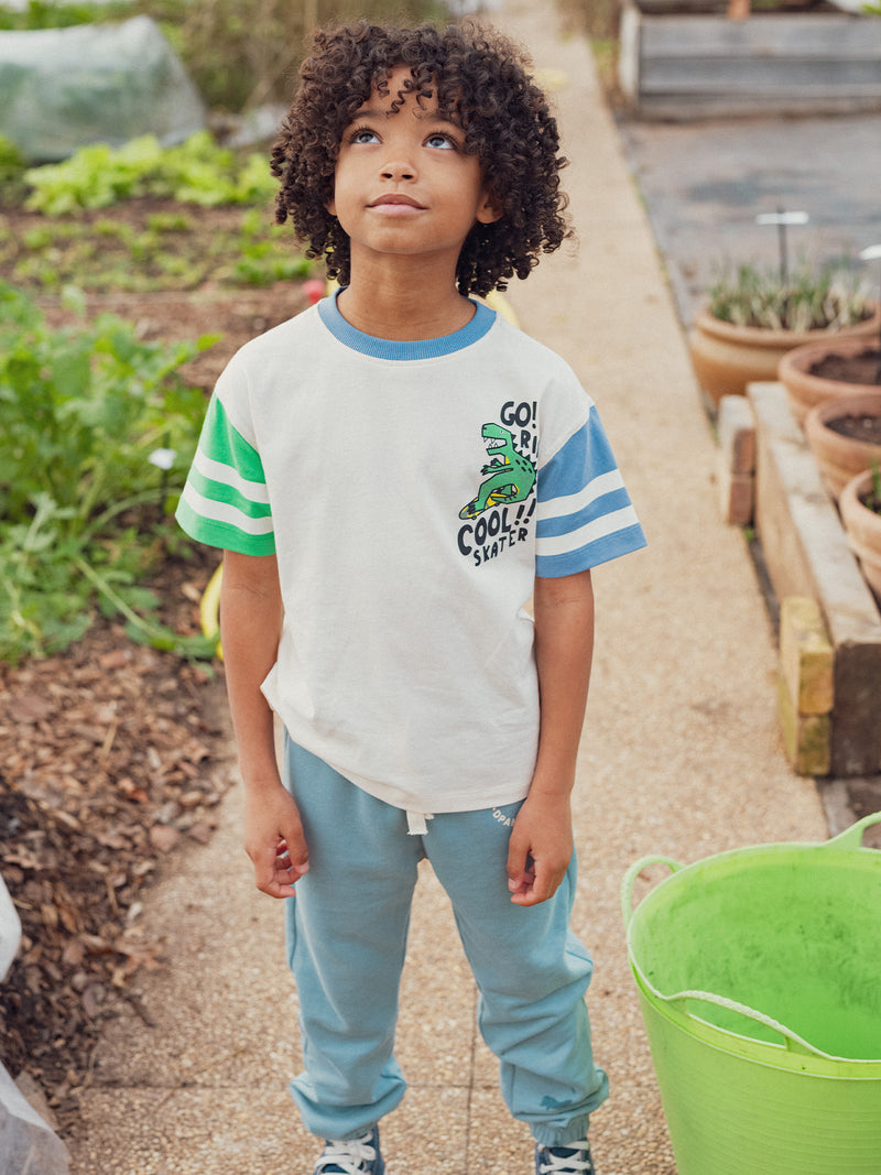 Camiseta de color ecru con animación de dinosaurios para niños
