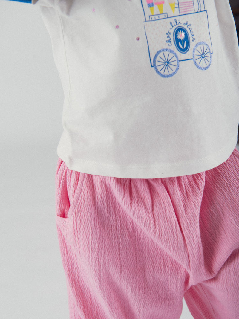 Pantalones rosa chicle con lazo para bebé niña