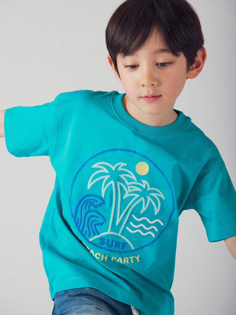 Camiseta azul turquesa con animación de playa para niño