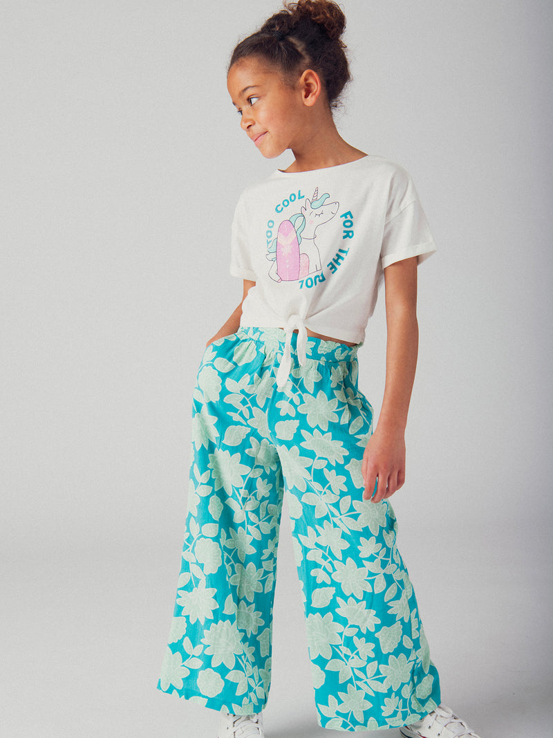 Pantalón azul impreso floral para niña