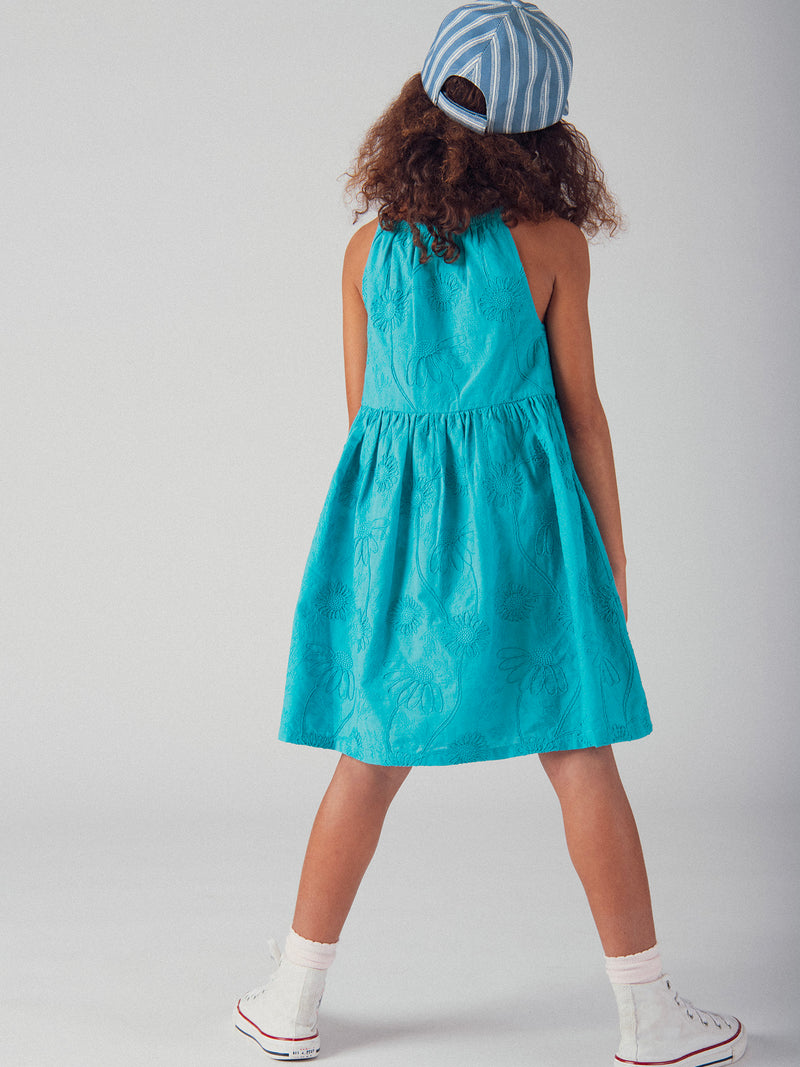Vestido azul completamente bordado para niña