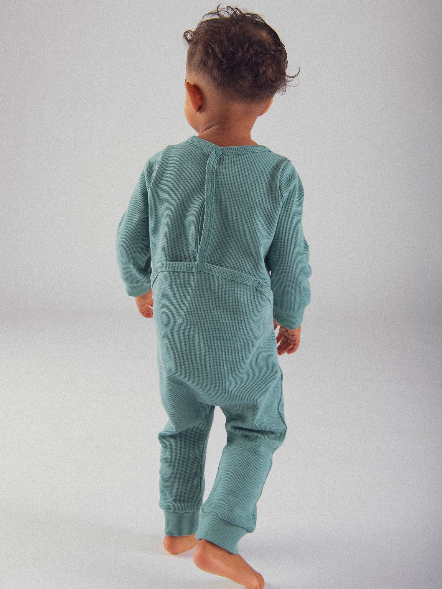 Grenouillère vert "Good Vibes" en maille gaufrée pour bébé garçon