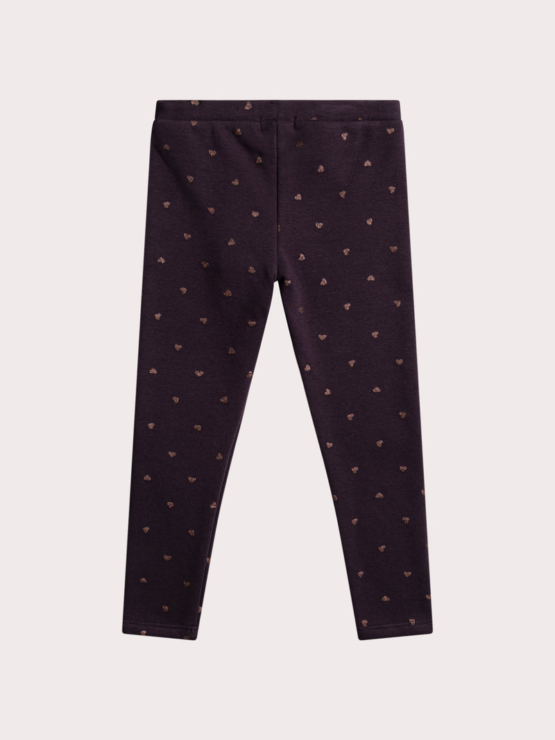 Leggings violetas con estampado de corazón y glitter