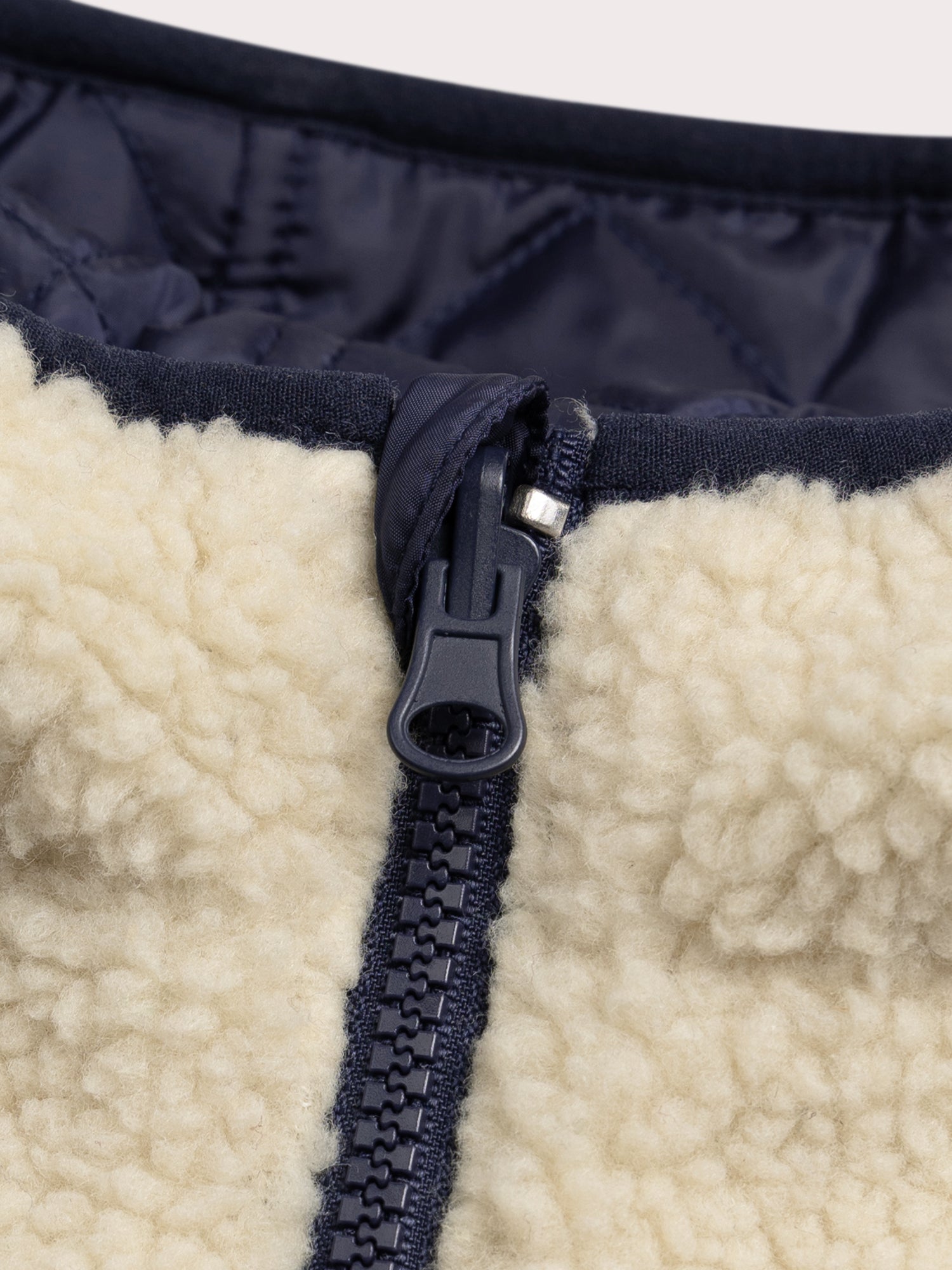 Manteau réversible effet mouton