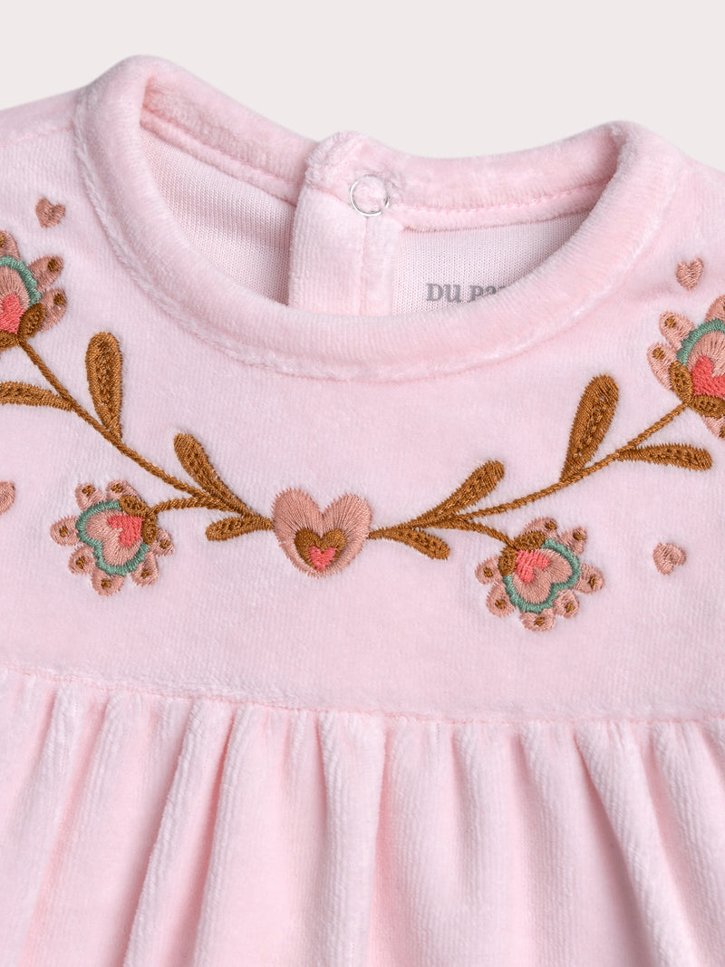Mameluco rosa pálido para bebé niña