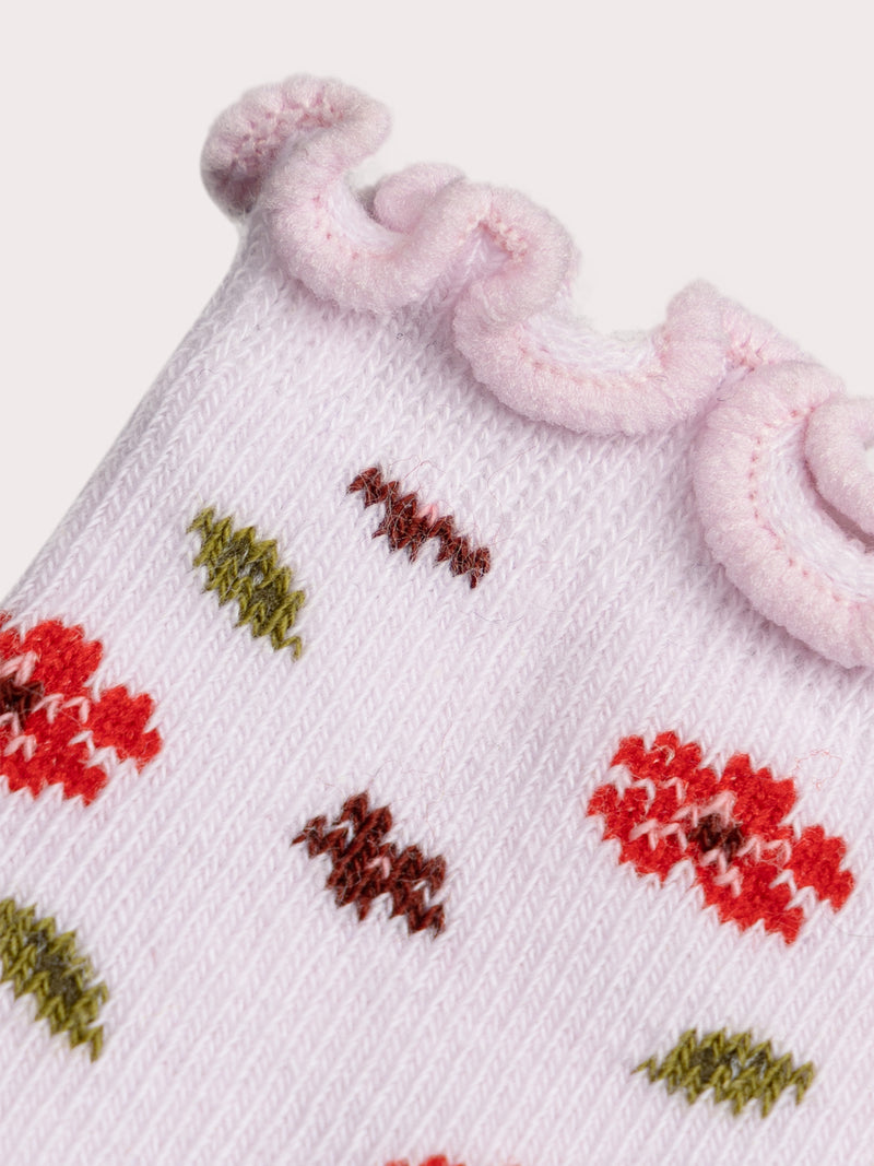 Calcetines rosas con flores para bebé niña