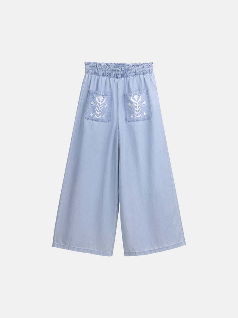 Pantalón azul con bordados florales para niña