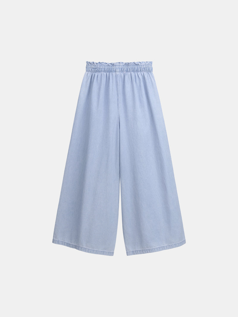 Pantalón azul con bordados florales para niña