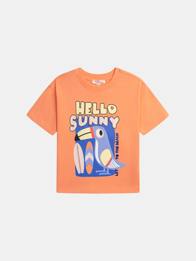 Camiseta naranja con animación de tucán para niños