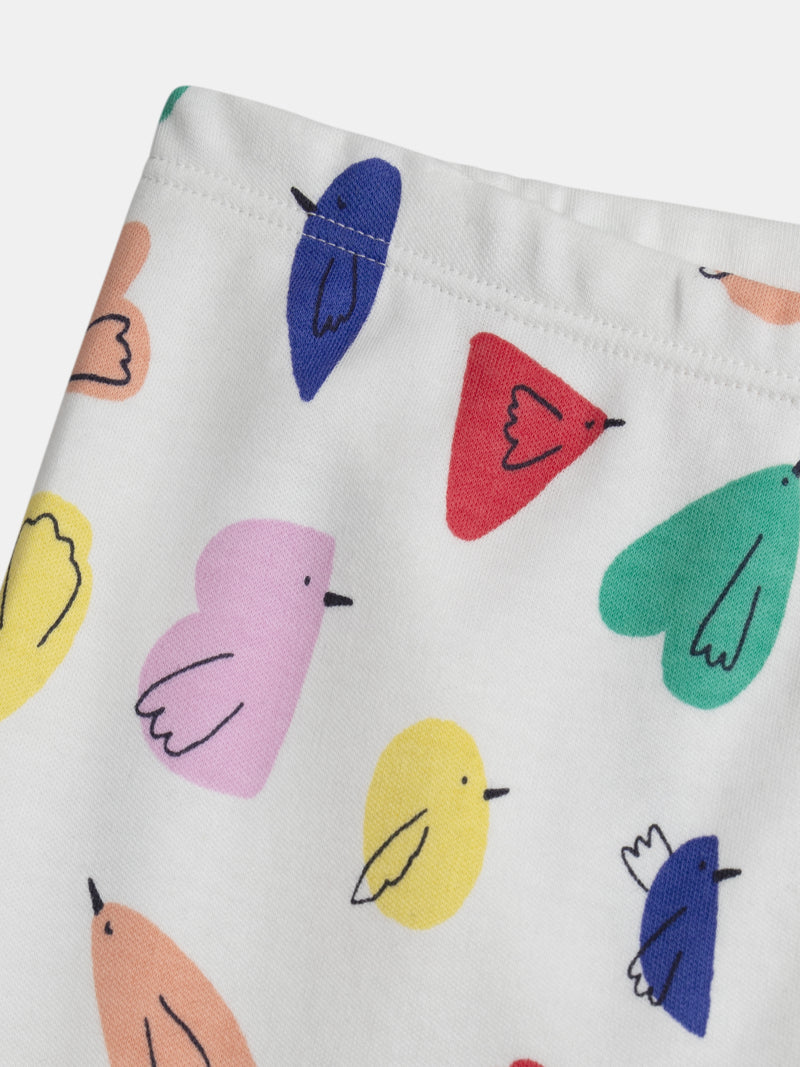 Pijama crema con estampado de pájaros para niña