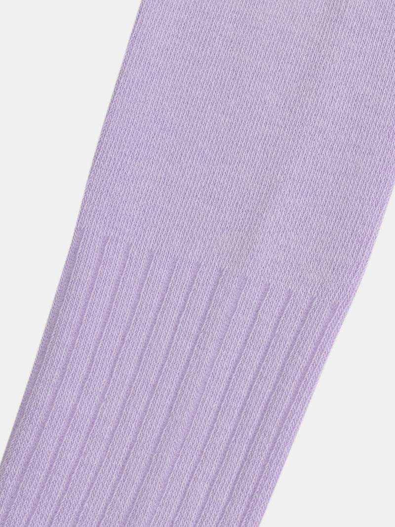 Medias lilas brillantes para niña
