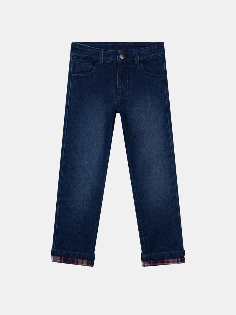 Jean de denim azul con bolsillos para niño