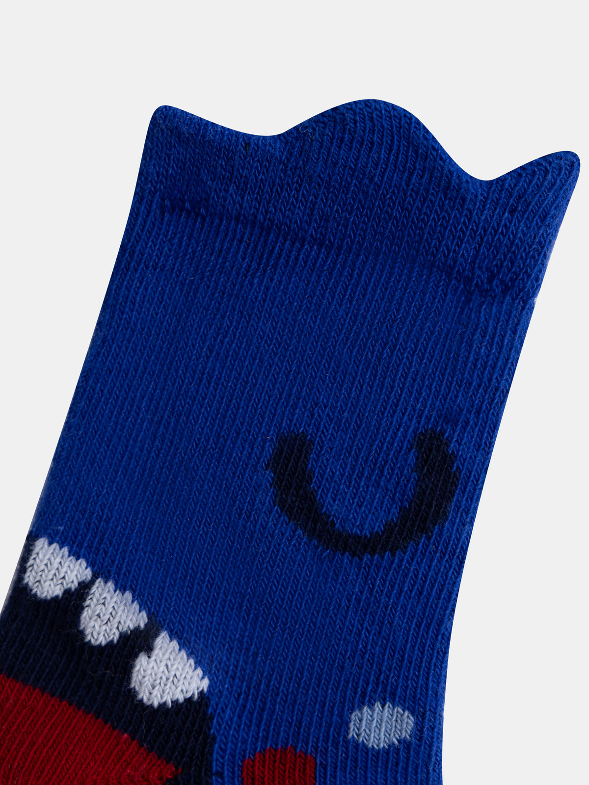 Calcetines azules con animación de dientes de dinosaurio para niño bebé
