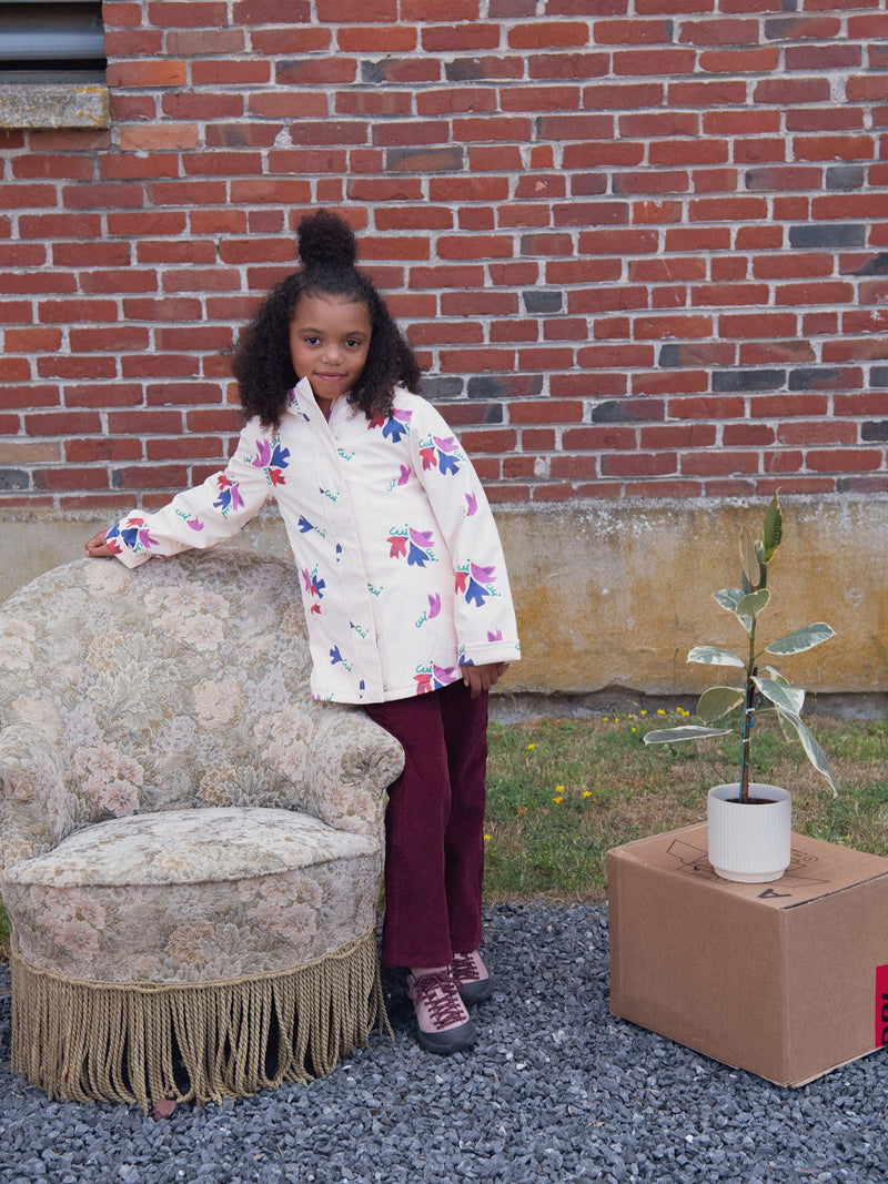 Impermeable con estampado de pájaros para niña