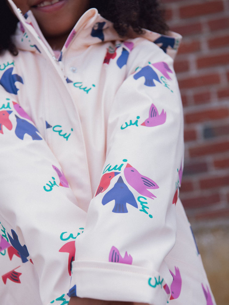 Impermeable con estampado de pájaros para niña