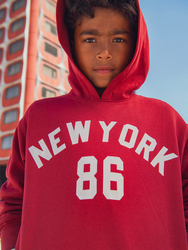 Sudadera roja con capucha para niño