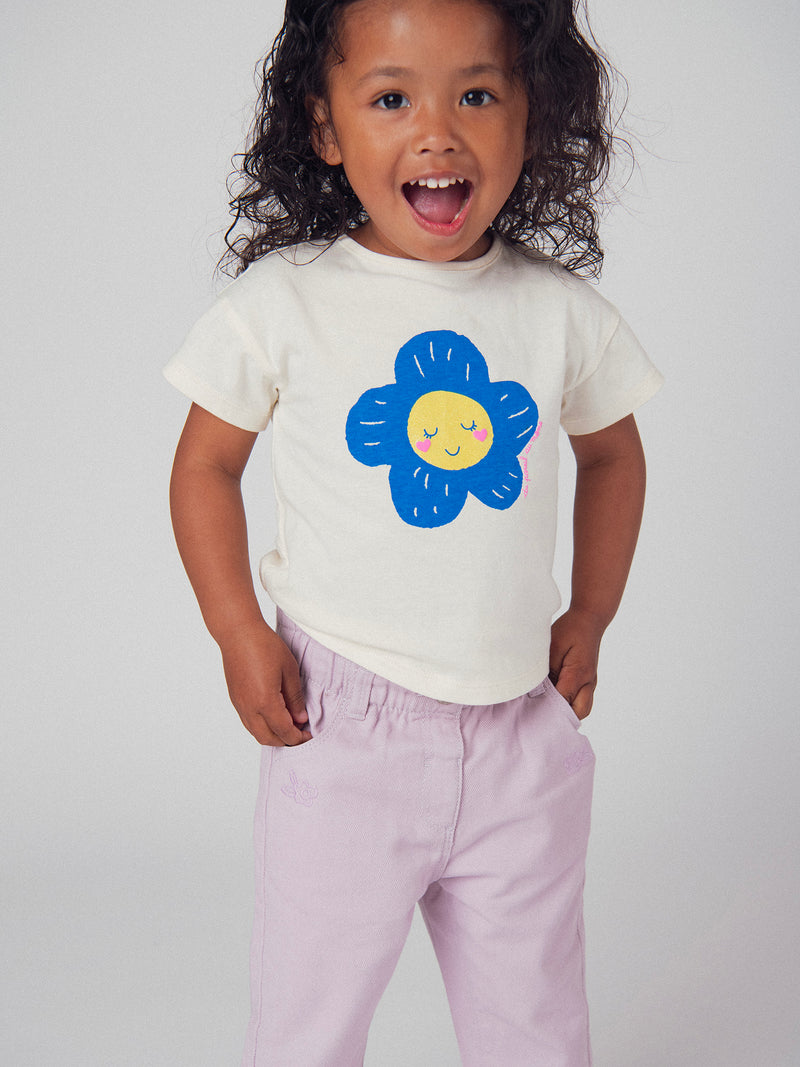 Camiseta ecru con motivo de flor para bebé niña
