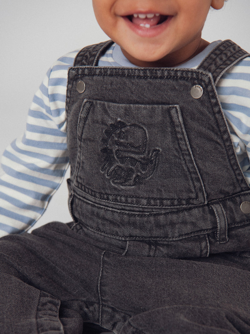 Mono de mezclilla gris "Dinosaurio" para bebé niño