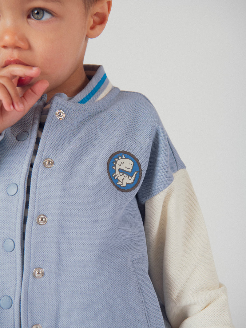 Cardigan bicolor estilo teddy para bebé niño