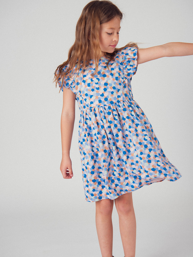 Vestido de niña con estampado de lunares y mangas cortas