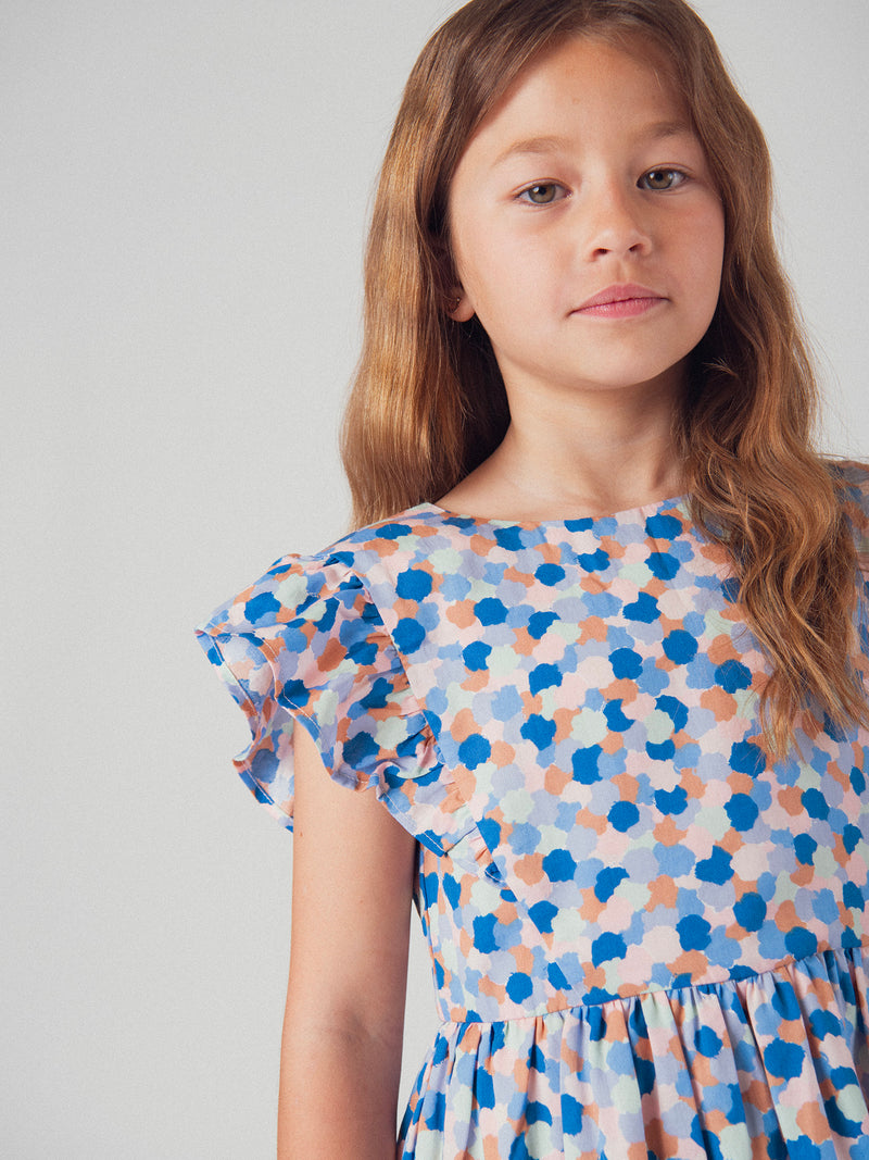 Vestido de niña con estampado de lunares y mangas cortas