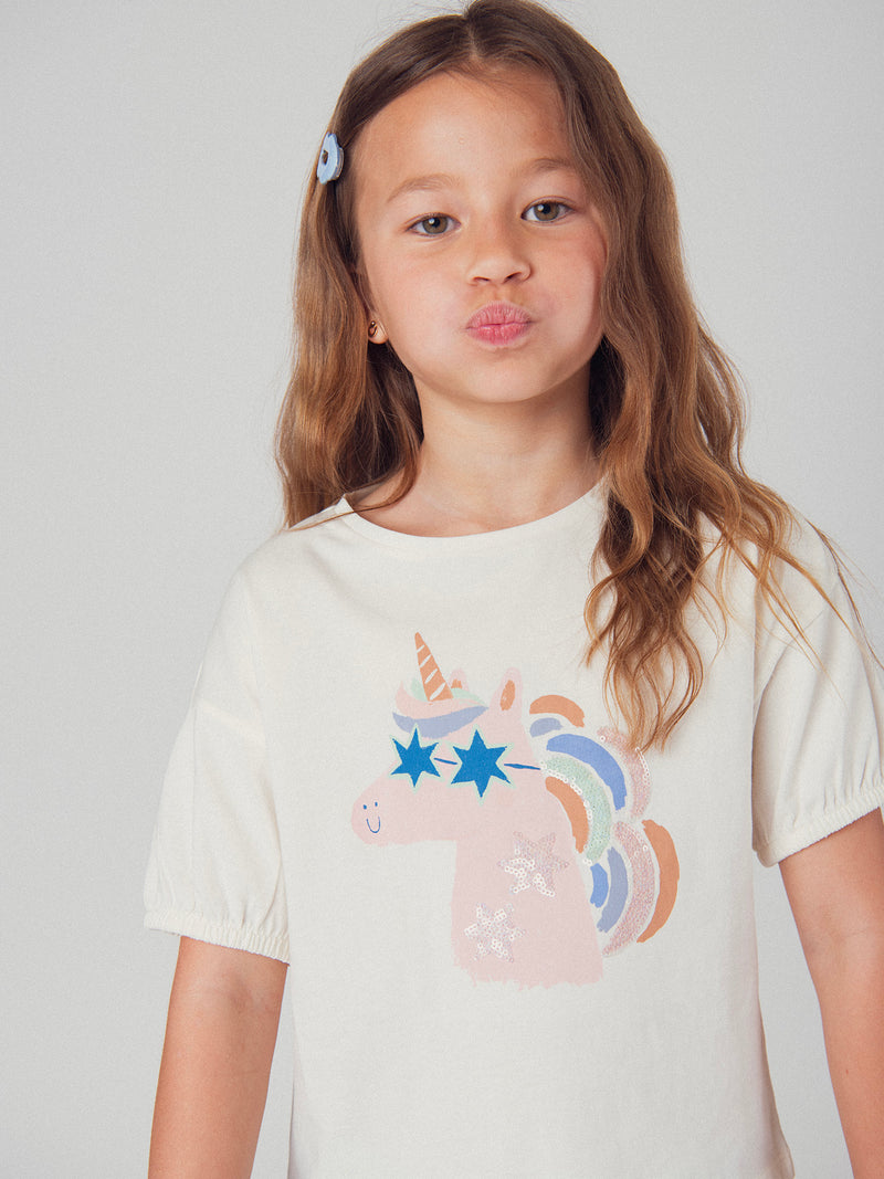 Camiseta ecru con animación de cabeza de unicornio para niña
