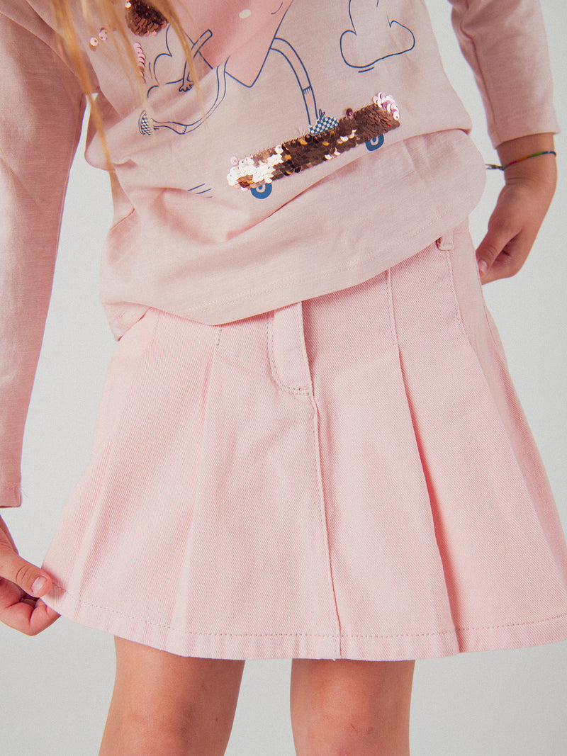 Falda corta rosa con bolsillos para niñas