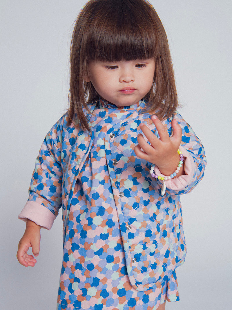 Cardigan reversible acolchado rosa con corazones para bebé niña