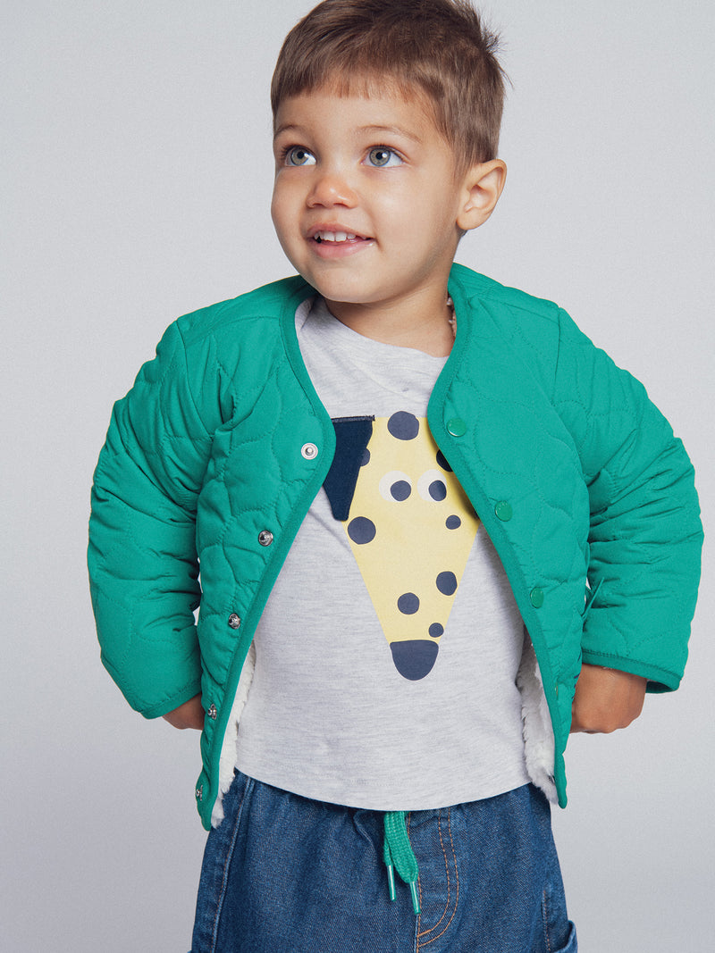 Chaleco reversible verde césped y crema "ARTY SCHOOL" para bebé niño