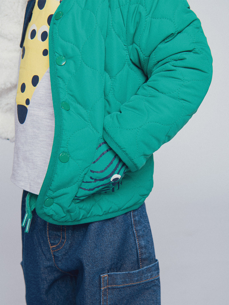 Chaleco reversible verde césped y crema "ARTY SCHOOL" para bebé niño