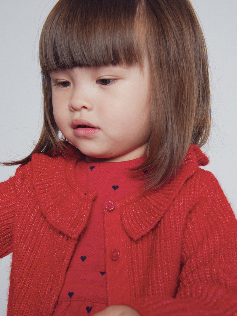 Cardigan rojo con volantes para niña