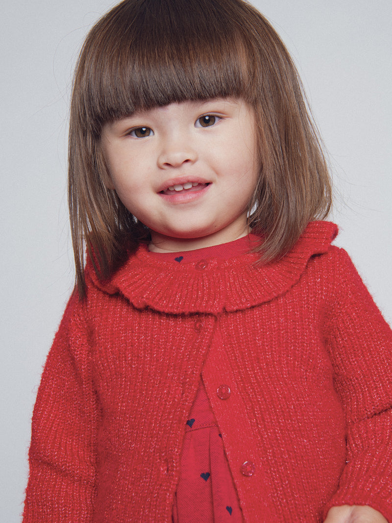 Cardigan rojo con volantes para niña